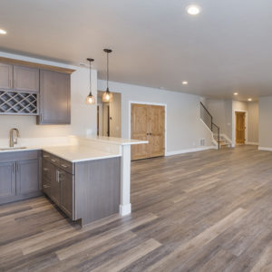 Basement Remodeled with Hardwood Floor | Home Remodeling by Southern Elite